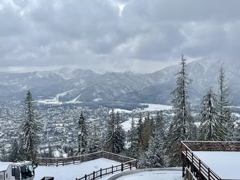 Scenic view of snowcapped mountains against sky