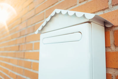 Close-up of white wall with closed door