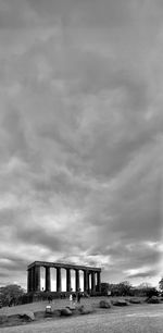 Built structure on beach against sky