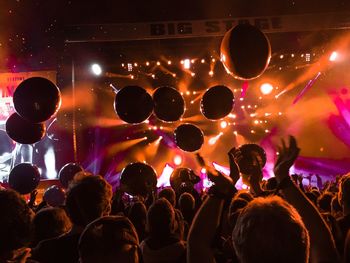 People enjoying music concert