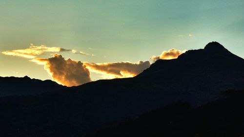 Scenic view of mountains at sunset