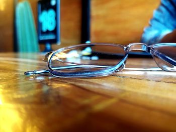 Close-up of eyeglasses on table