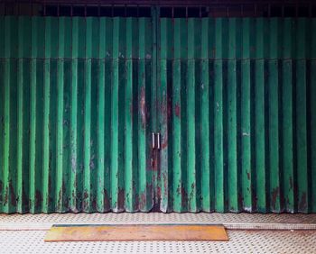 Closed metal door of footpath