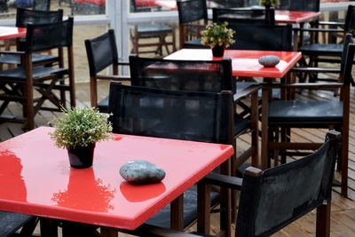 Empty chairs and tables at cafe