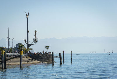 View of the jetty on lake constance at meersburg, germany