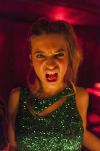 Portrait of a beautiful young woman at a nightclub