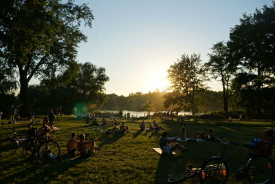 People relaxing in park