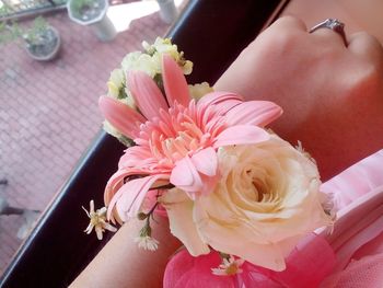 High angle view of woman holding bouquet