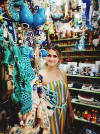 Rear view of woman standing in store