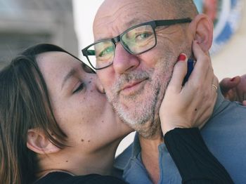 Close-up of young couple kissing