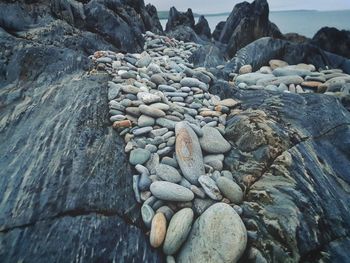 Close-up of stones on beach