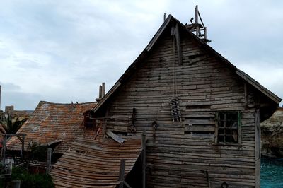 Low angle view of old building against sky