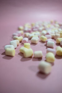 High angle view of multi colored candies on table