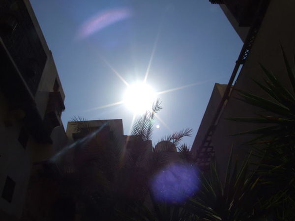 LOW ANGLE VIEW OF BUILDINGS AGAINST SKY