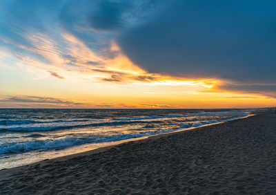 Scenic view of sea against sky during sunset