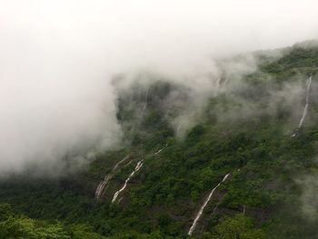 Scenic view of landscape in foggy weather