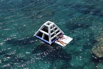 High angle view of ship floating on sea