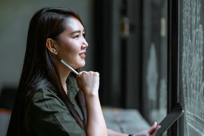 Young woman using mobile phone