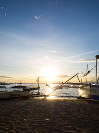 Scenic view of sea at sunset