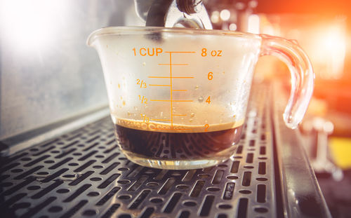 Close-up of coffee cup on table