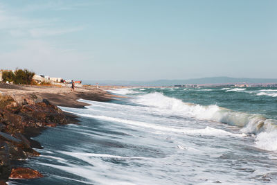 Scenic view of beach against sky