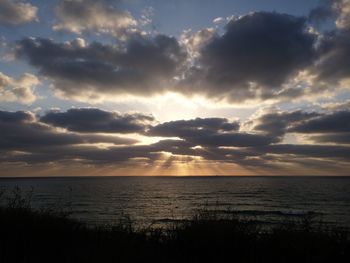 Scenic view of sea at sunset