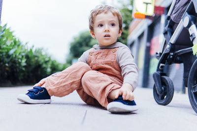 Portrait of cute boy looking away