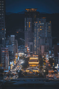 Illuminated city lit up at night