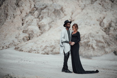 Couple standing outdoors