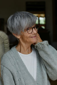 Portrait of young woman looking away