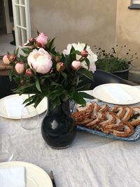 Close-up of flowers on table at home