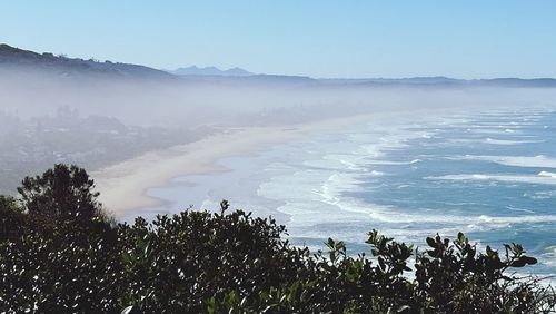 Scenic view of sea against clear sky