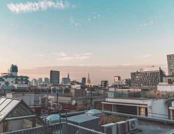 High angle view of buildings against sky during sunset