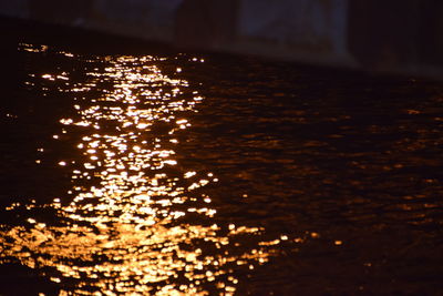 Close-up of illuminated water at night