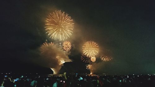 Firework display at night