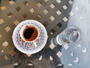 High angle view of coffee cup on table