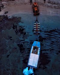 High angle view of ship moored in sea