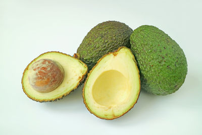 Close-up of avocado against white background