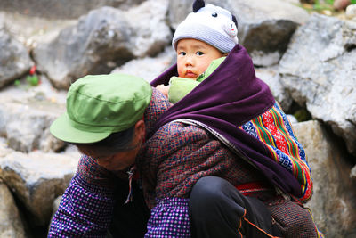 A boy on his mother's back