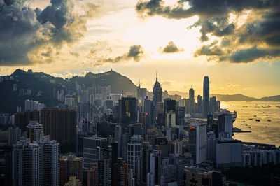 Cityscape against sky during sunset