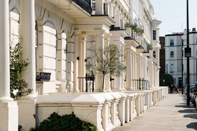 Residential townhouses and pedestrian walkway in notting hill, london england, uk