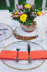 High angle view of various flowers in plate on table