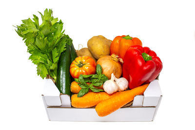 Fruits and vegetables on white background