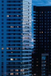 Full frame shot of modern building at night