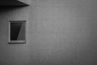 Close-up of window on wall of building