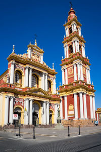 Low angle view of historical building against clear blue sky in salta, argentina