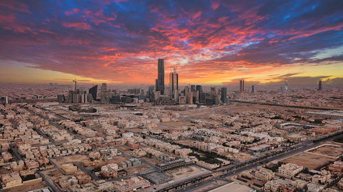 High angle view of cityscape against sky during sunset