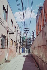 Alley amidst buildings in city