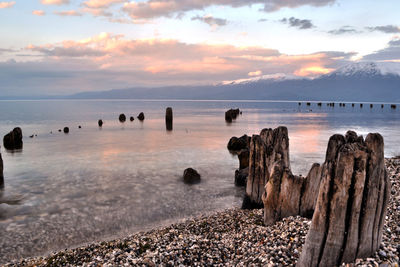 Scenic view of sea against cloudy sky