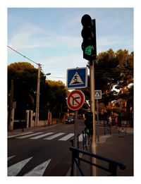 Road sign on street in city